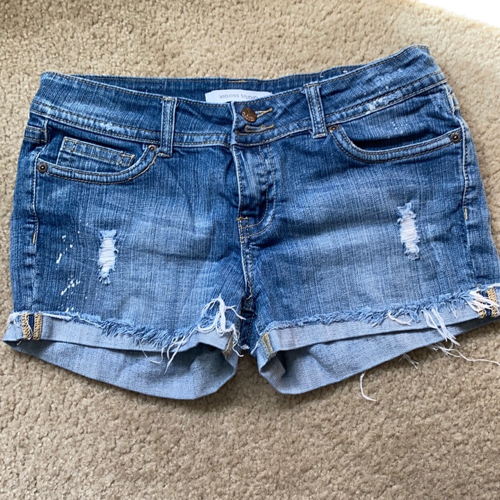 Denim shorts with distressed details
